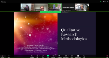A screenshot from a Zoom meeting showing 5 participants and a slide titled, 